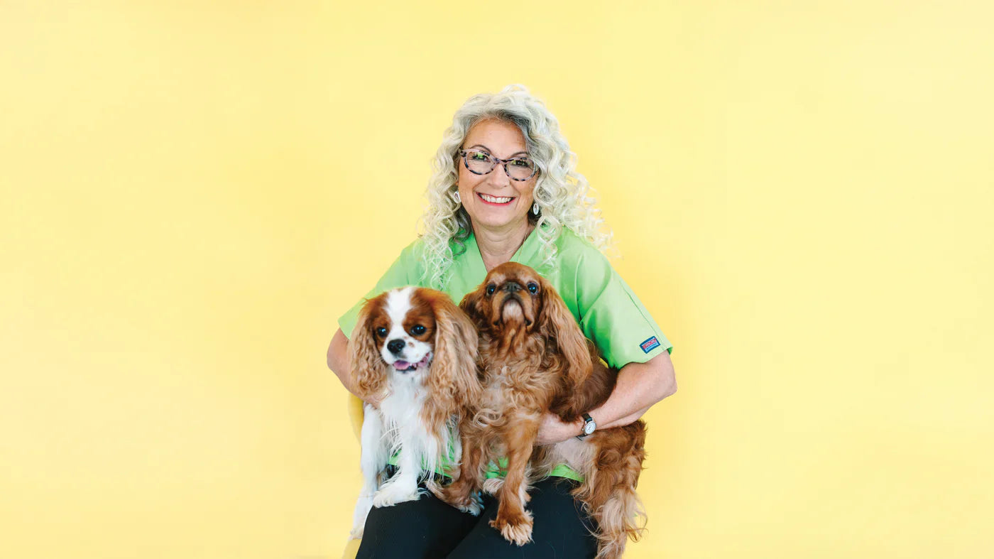 Dr. Judy Morgan with her two dogs