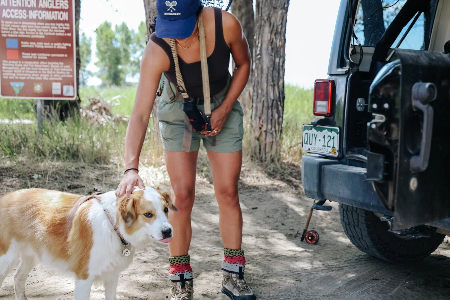 Owner standing outside with her dog