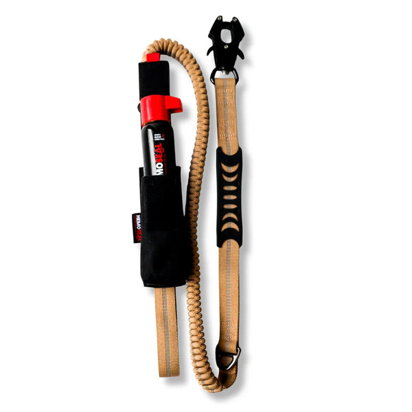 Dog leash with coiled design and metal clip on a white background
